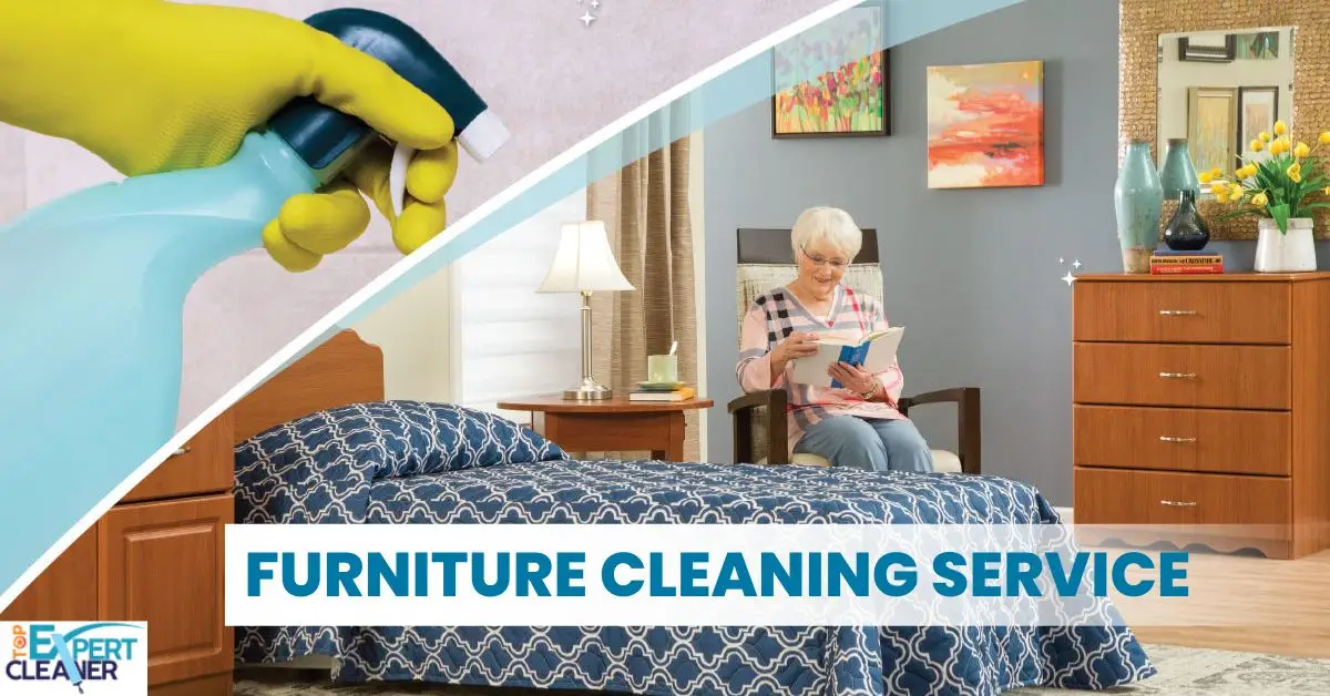 An image advertising "FURNITURE CLEANING SERVICE". The image is split diagonally. The top-left section shows a close-up of a hand in a yellow glove holding a blue spray bottle, with sparkling effects around it, suggesting cleaning. The bottom-right section shows a furnished bedroom scene with a bed featuring a blue and white patterned duvet, a wooden nightstand with a lamp, a wooden dresser, and an elderly woman sitting in an armchair reading a book. A logo that says "EXPERT CLEANER" with a shield icon is in the bottom-left corner.